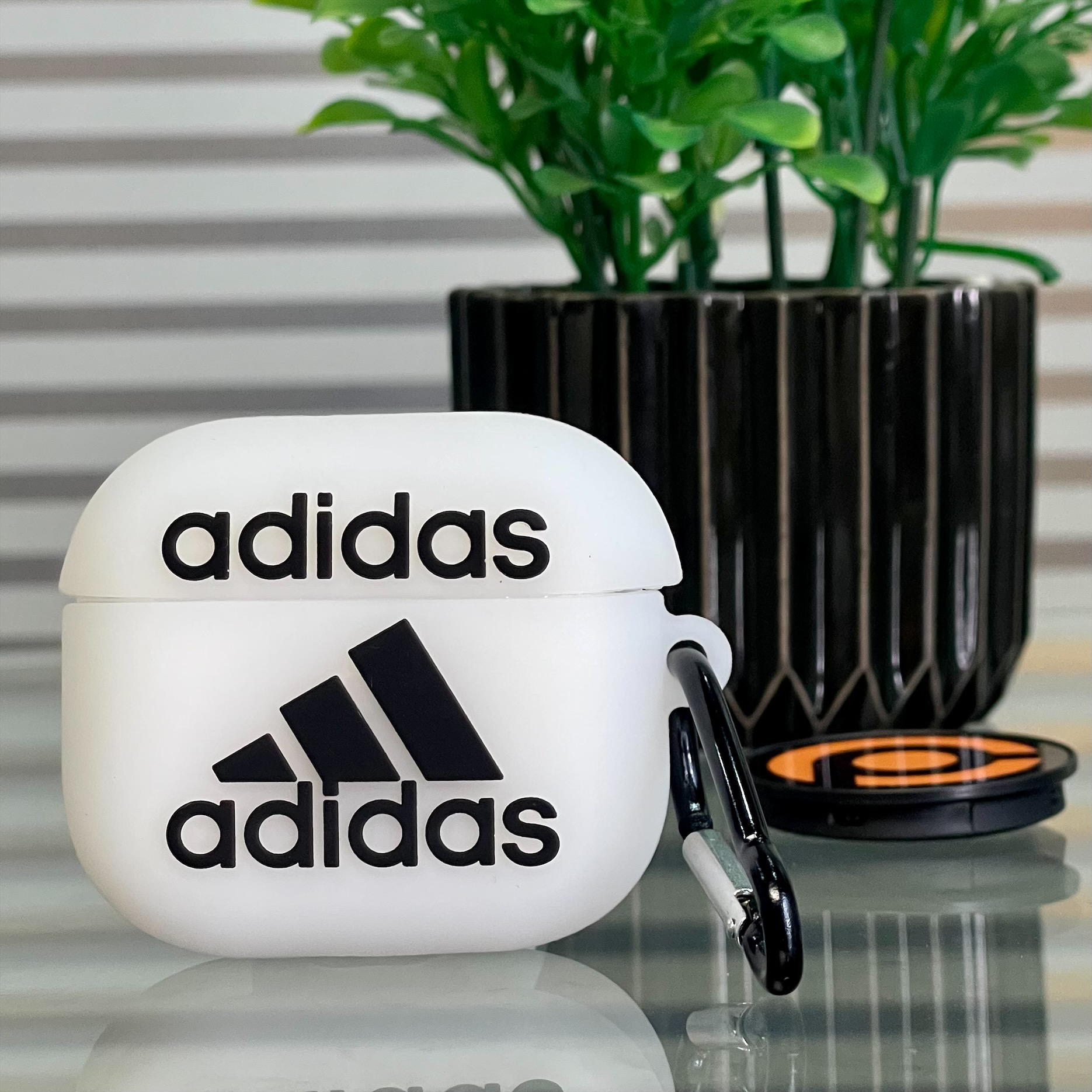 Adidas online airpod case